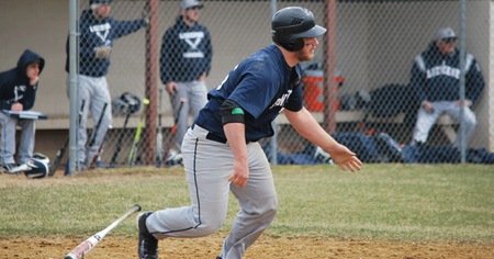 Aaron Glass takes off for first base.