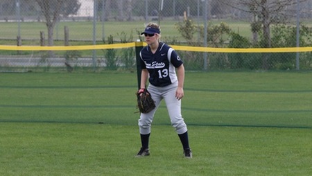 Bree Fetterman stands at the ready in the outfield.